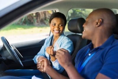depositphotos_57411587-stock-photo-woman-being-handed-drivers-license